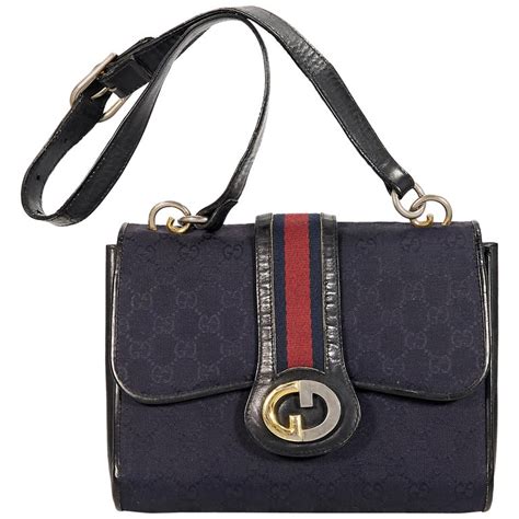 vintage gucci navy handbag|gucci ophidia large shoulder bag.